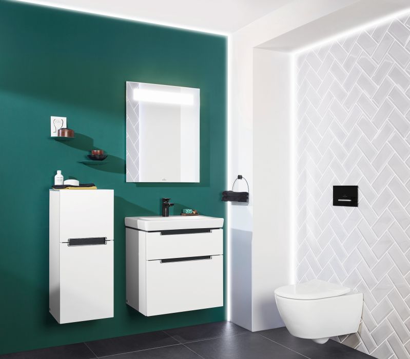 Ba&ntilde;o minimalista en verde con azulejos tipo metro